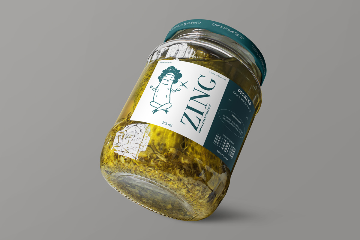 Branded Zing pickle jar with green details and a playful illustration of a calm, meditating pickle. 
